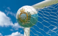 Flag of San Marino and soccer ball in goal net