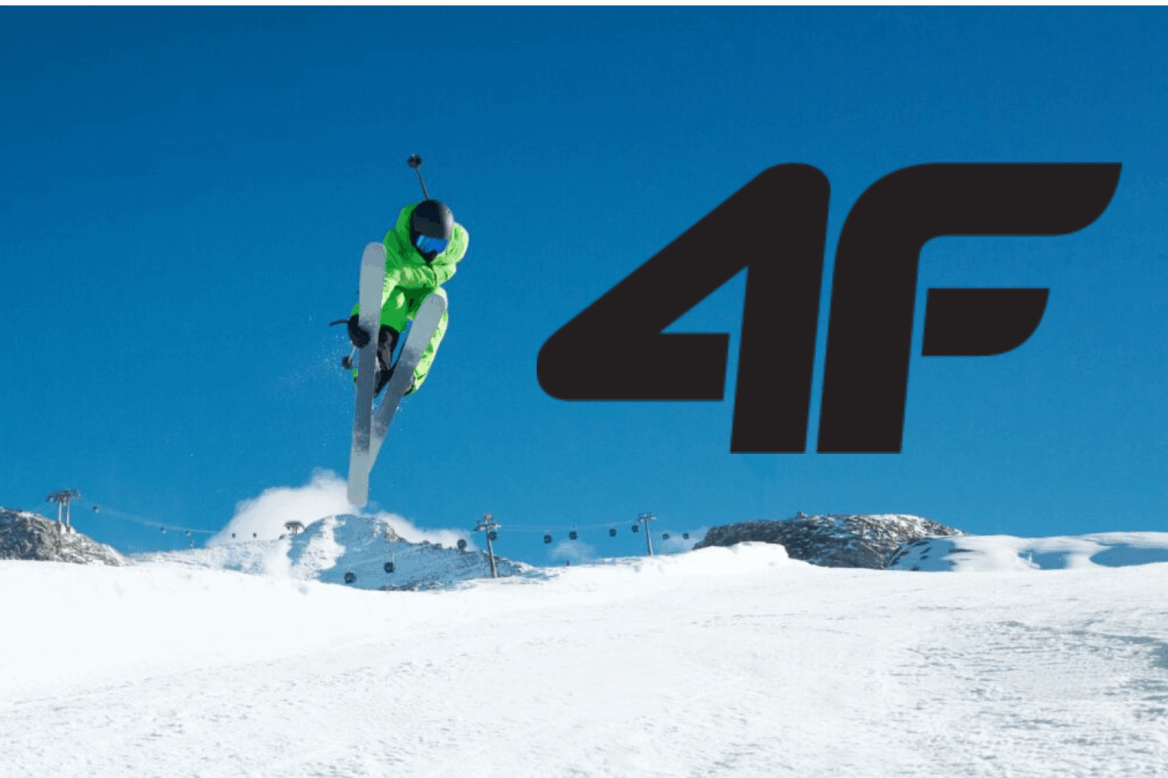 Narciarz w zielonym kombinezonie wykonuje skok na śnieżnym stoku z dużym logo 4F na tle nieba.