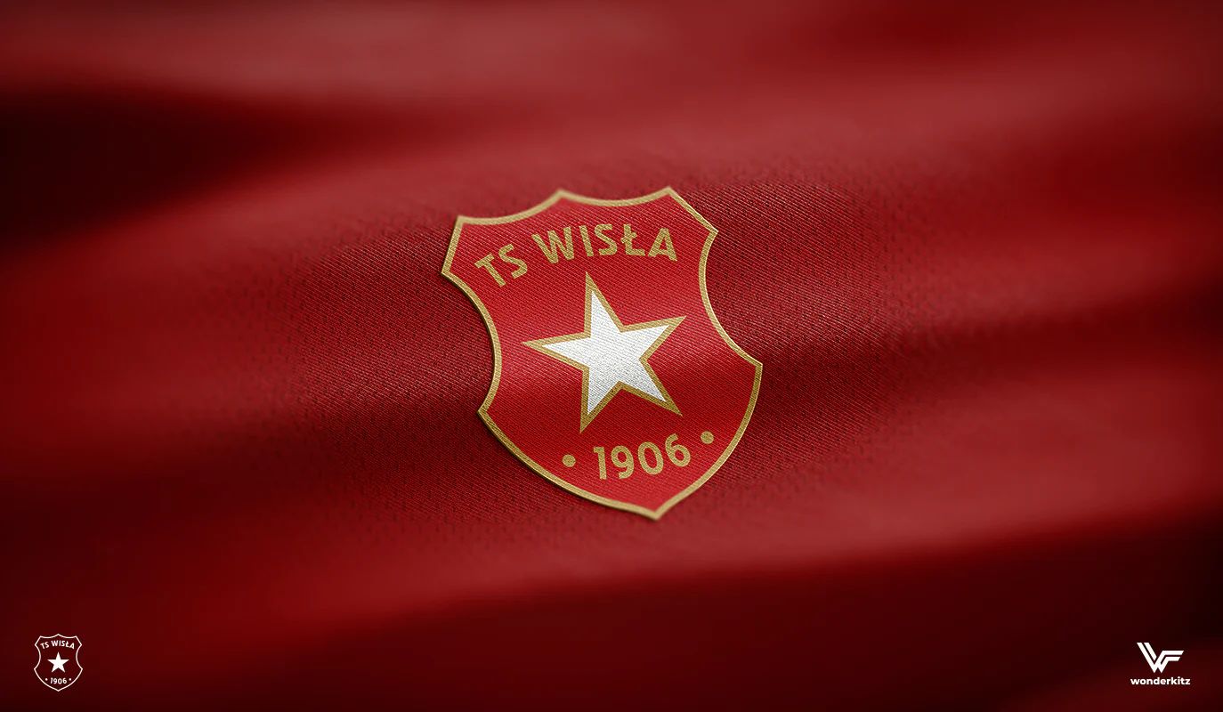 Aplikacja herbu głównego Wisły Kraków. wyhaftowana złotą nicią na czerwonej, pofalowanej tkaninie. Na tarczy widnieje biała gwiazda, napis „TS WISŁA” oraz rok „1906”. Prezentacja oficjalnego emblematu klubu.